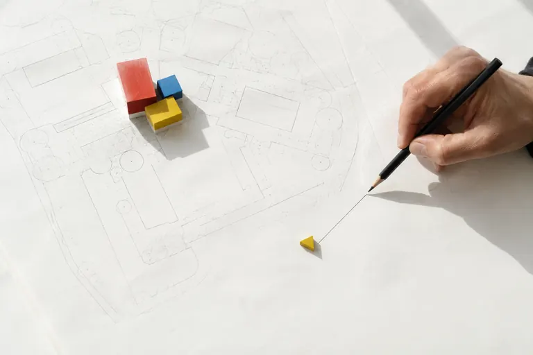 Main reliant au crayon un bloc isolé au reste d’un plan, image des pages orphelines